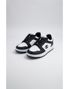 Zapatillas Champion Blancas y Negras de Piel | Estilo Deportivo y Comodidad (S32415-WW019). 2