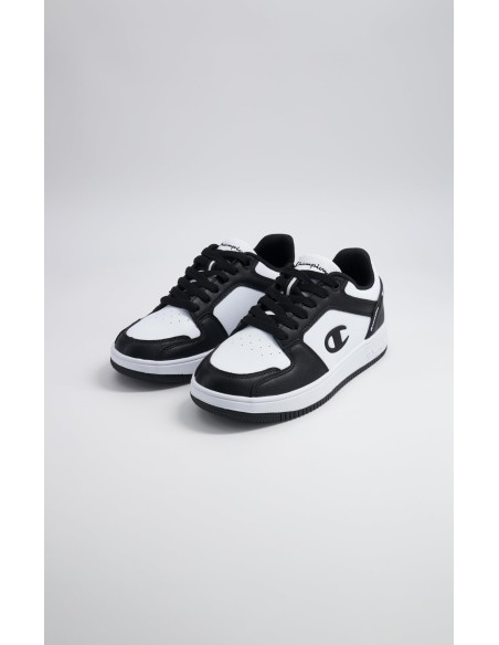 Zapatillas Champion Blancas y Negras de Piel | Estilo Deportivo y Comodidad (S32415-WW019). Zapatillas Champion Blancas y Negras de Piel | Estilo Deportivo y Comodidad (S32415-WW019).