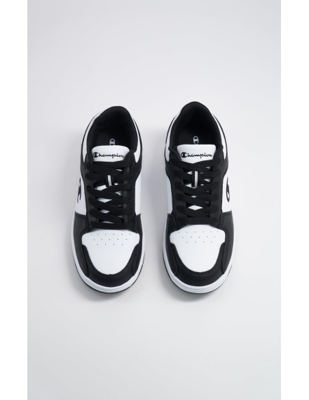 Zapatillas Champion Blancas y Negras de Piel | Estilo Deportivo y Comodidad (S32415-WW019). Zapatillas Champion Blancas y Negras de Piel | Estilo Deportivo y Comodidad (S32415-WW019).