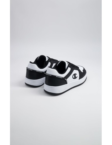 Zapatillas Champion Blancas y Negras de Piel | Estilo Deportivo y Comodidad (S32415-WW019).