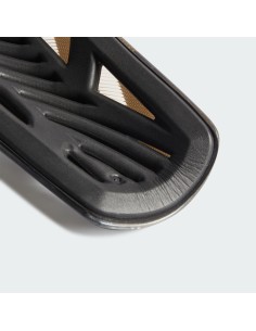 ESPINILLERAS TIRO ADIAS NEGRO DORADAS (IP4000). 2